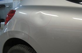 Wgniecenie błotnika tylnego Peugeot 207